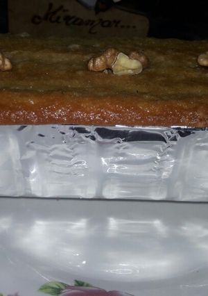 Una foto de Budín casero de vainilla y nuez😉