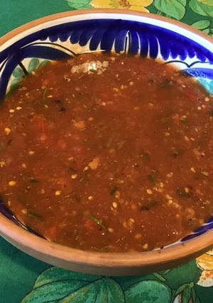 Une photo de Marinade tomates, épices et romarin
