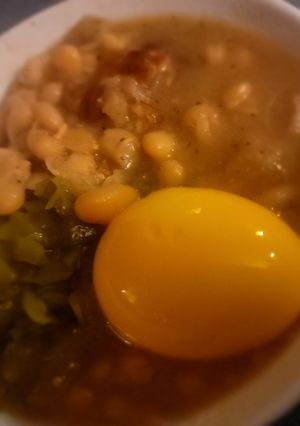 A picture of White Bean Soup w/ Pork Jowl, Chow-Chow and Jalapeño Pickled Egg.