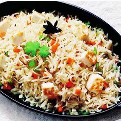 A picture of Lemon Rice with Paneer.