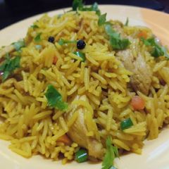 A picture of Chicken fried rice.