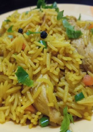 A picture of Chicken fried rice.