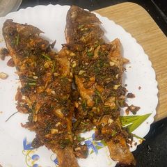Finger licking fish fry A picture of Finger licking fish fry.