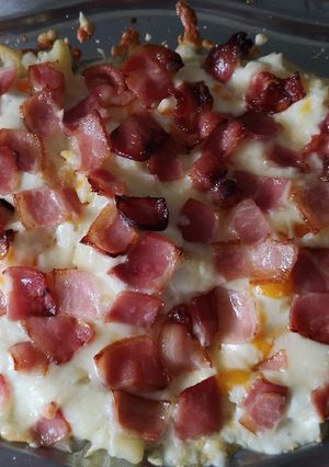 Una foto de Patatas con queso y bacon