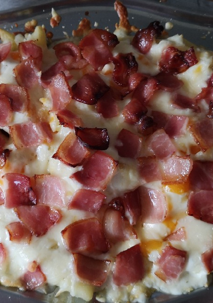 Una foto de Patatas con queso y bacon