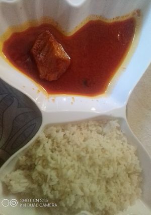 A picture of Tasty White rice and chicken stew 😋😋🥰💞.