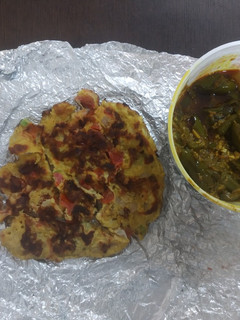 A picture of Besan chilla with sabzi.