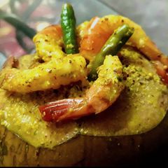 A picture of Daab Chingri#wds# Green Coconut Prawn curry.