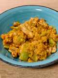 Trampantojo de paella con lentejas peladas