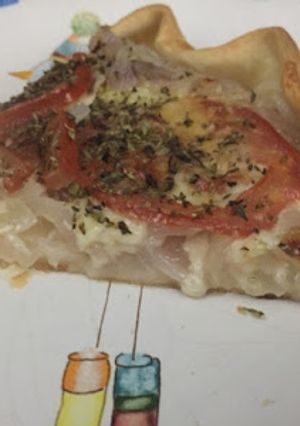 Una foto de Tarta de cebolla y tomate