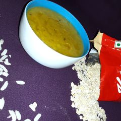 A picture of Flatten rice oats salty porridge.