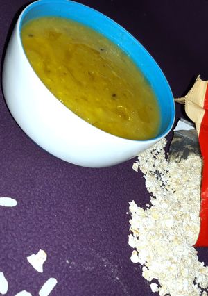 A picture of Flatten rice oats salty porridge.