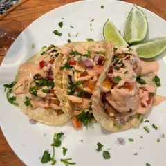 A picture of Shrimp and chicken tacos.