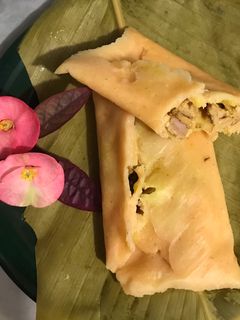 Una foto de Hallacas de masa de maíz