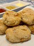 Nuggets de pollo y cebolla caramelizada al horno