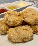 Nuggets de pollo y cebolla caramelizada al horno