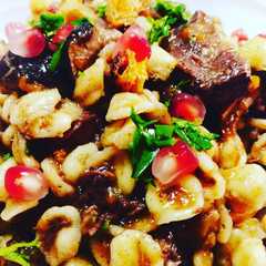Foto di Orecchiette con ragù di cinghiale e melograno