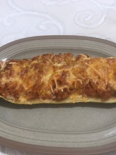 Una foto de Calabacín relleno de pollo y pavo