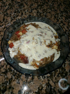 Una foto de Ensalada de caballa, 4 quesos y peras marinadas