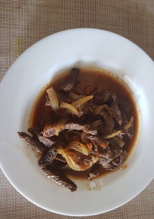 Una foto de Fajitas encebollada