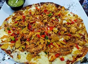 Una foto de OTRA Arepizza con relleno de Pollo...!