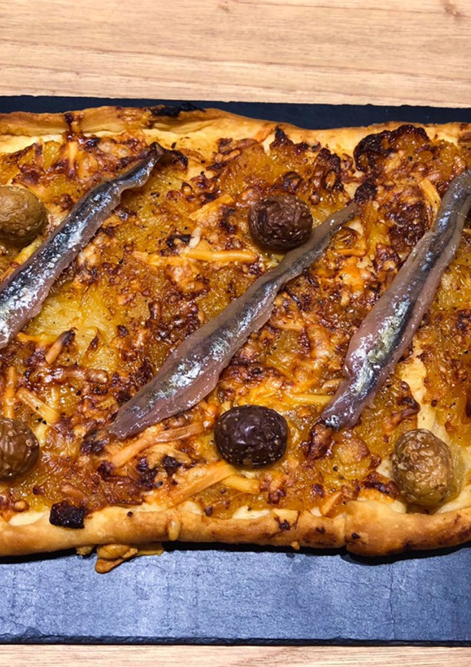 Una foto de Coca con anchoas