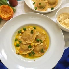 A picture of Besan raviolis with sweet and tangy sauce.