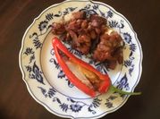 A picture of stuffed red peppers