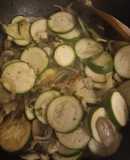 Salmon fillets with courgettes onion and mushrooms