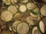 Salmon fillets with courgettes onion and mushrooms
