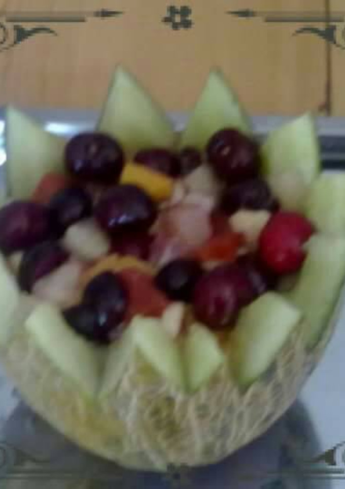 Una foto de Cesta de melón con macedonia natural