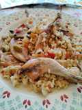 Arroz con codornices y conejo