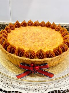 Una foto de Pastel de coco y Dulce de leche