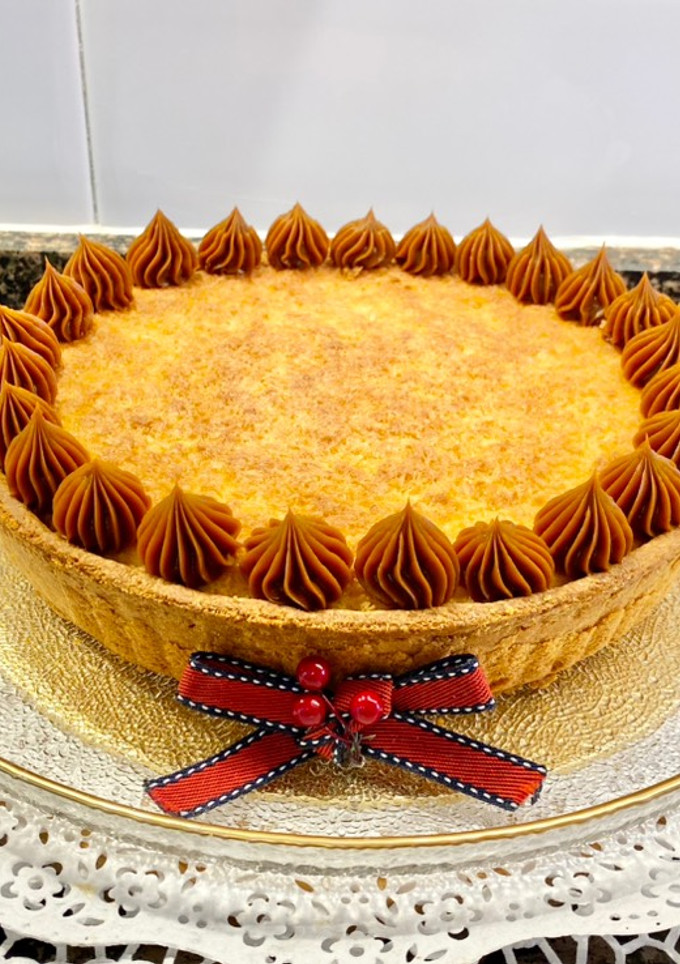 Una foto de Pastel de coco y Dulce de leche
