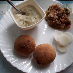 Baked liti with baigan ka bharta A picture of Baked liti with baigan ka bharta.