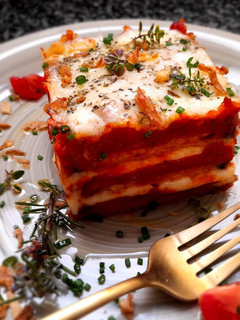 Una foto de Berenjenas a la parmesana
