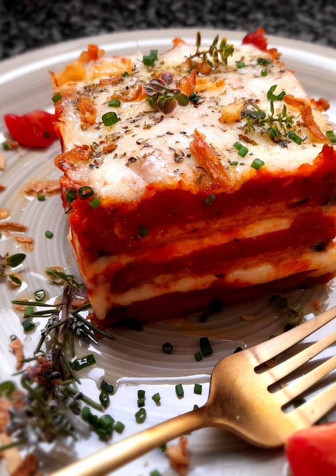 Una foto de Berenjenas a la parmesana