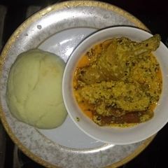 Egusi soup with chicken A picture of Egusi soup with chicken.