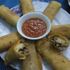 A picture of Chicken cheese spring roll.