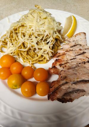 A picture of Brad's grilled chicken with green tomato spaghetti.