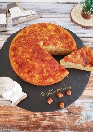 Une photo de Gâteau fondant pommes/noisettes et praliné croustillant