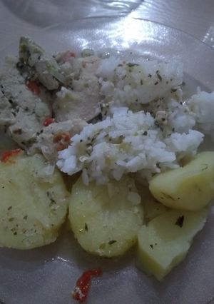 Una foto de Pechuga con papas y arroz