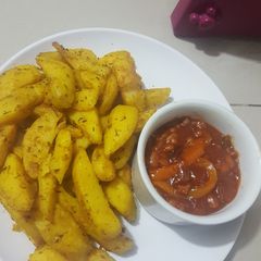 A picture of Oven Roasted Potatoes || Refried Beans.