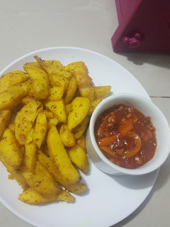 A picture of Oven Roasted Potatoes || Refried Beans.