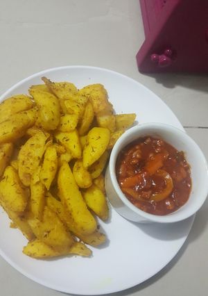 A picture of Oven Roasted Potatoes || Refried Beans.