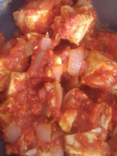 Una foto de Tofu encebollado