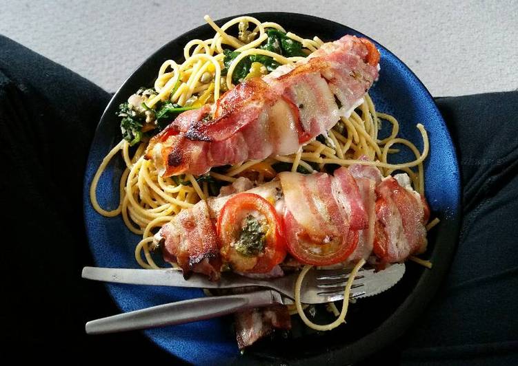 Bacon - wrapped fish with spaghetti