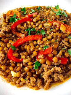 Una foto de Lentejas al curry rojo con ternera