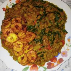 A picture of Honey Beans Jollof and Fried Plaintain.