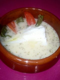 Una foto de Bacalao en salsa verde